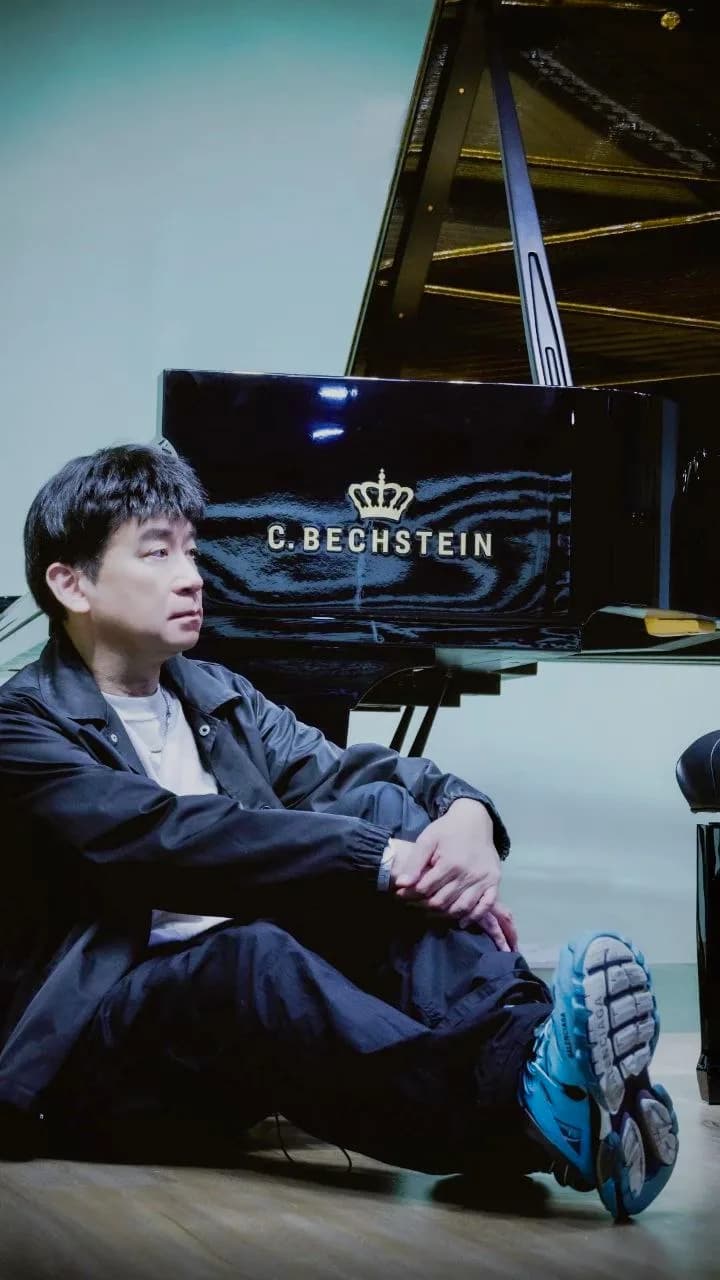 Press cut-out of Victor at the piano